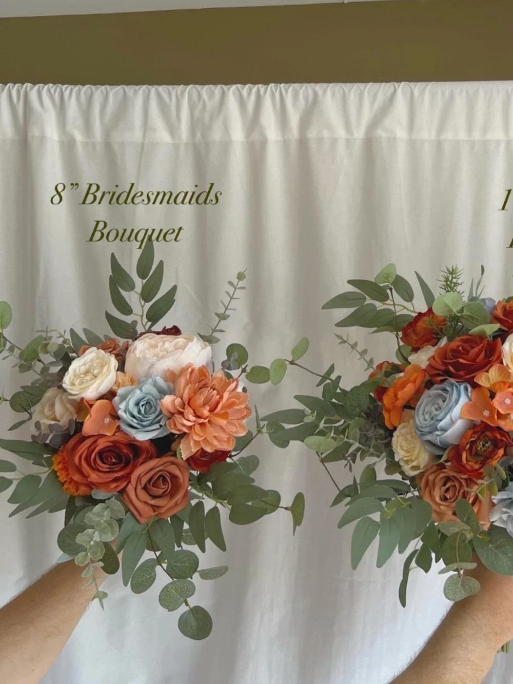 Faux bridal bouquets with rust orange, dusty blue, & eucalyptus.